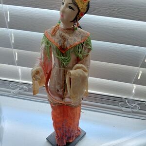 Handcrafted Sculpture with Orange and Green Details